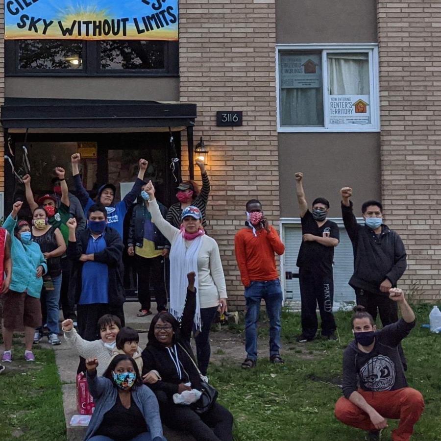 people-protesting-in-front-of-apartment-building