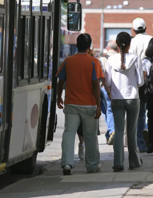 people moving to a bus