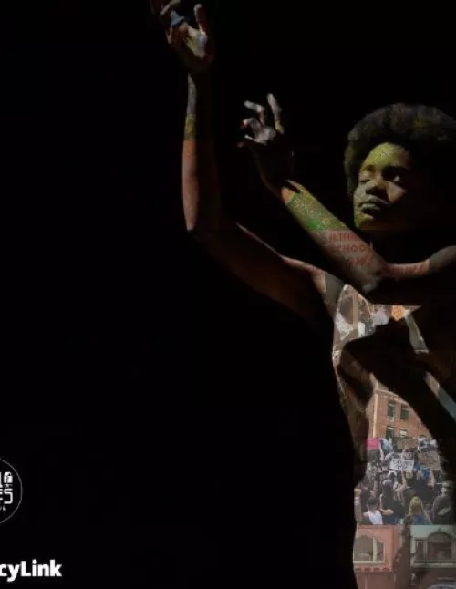black woman performs